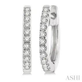 1/6 ctw Round Cut Diamond Petite Fashion Huggie Earrings in 14K White Gold