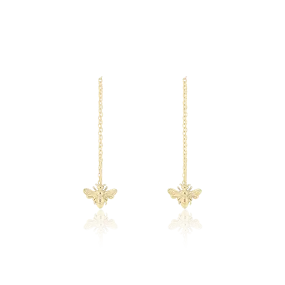 Gold coloured earrings with bee