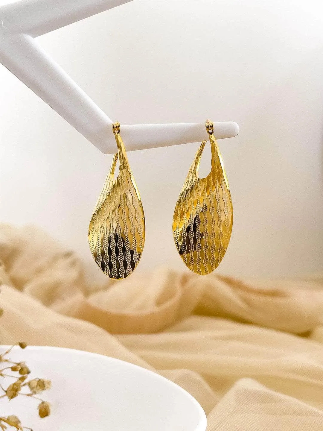 Hammered Golden Oval Earrings