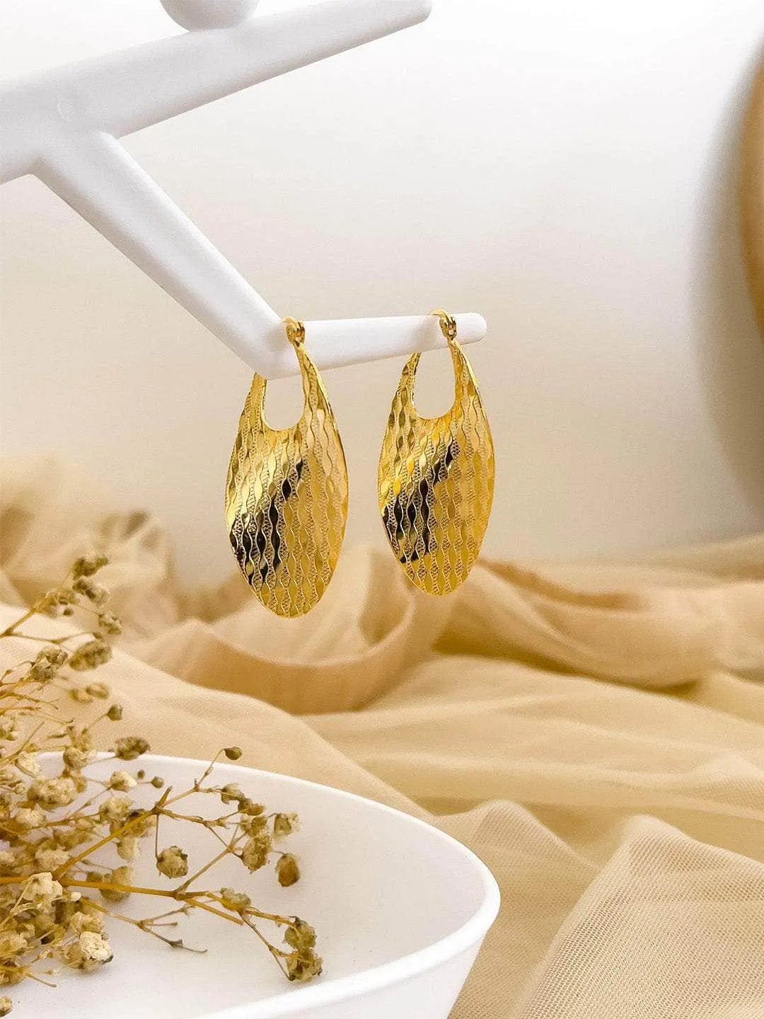 Hammered Golden Oval Earrings