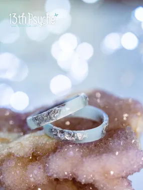 Pastel blue faceted resin ring with silver flakes